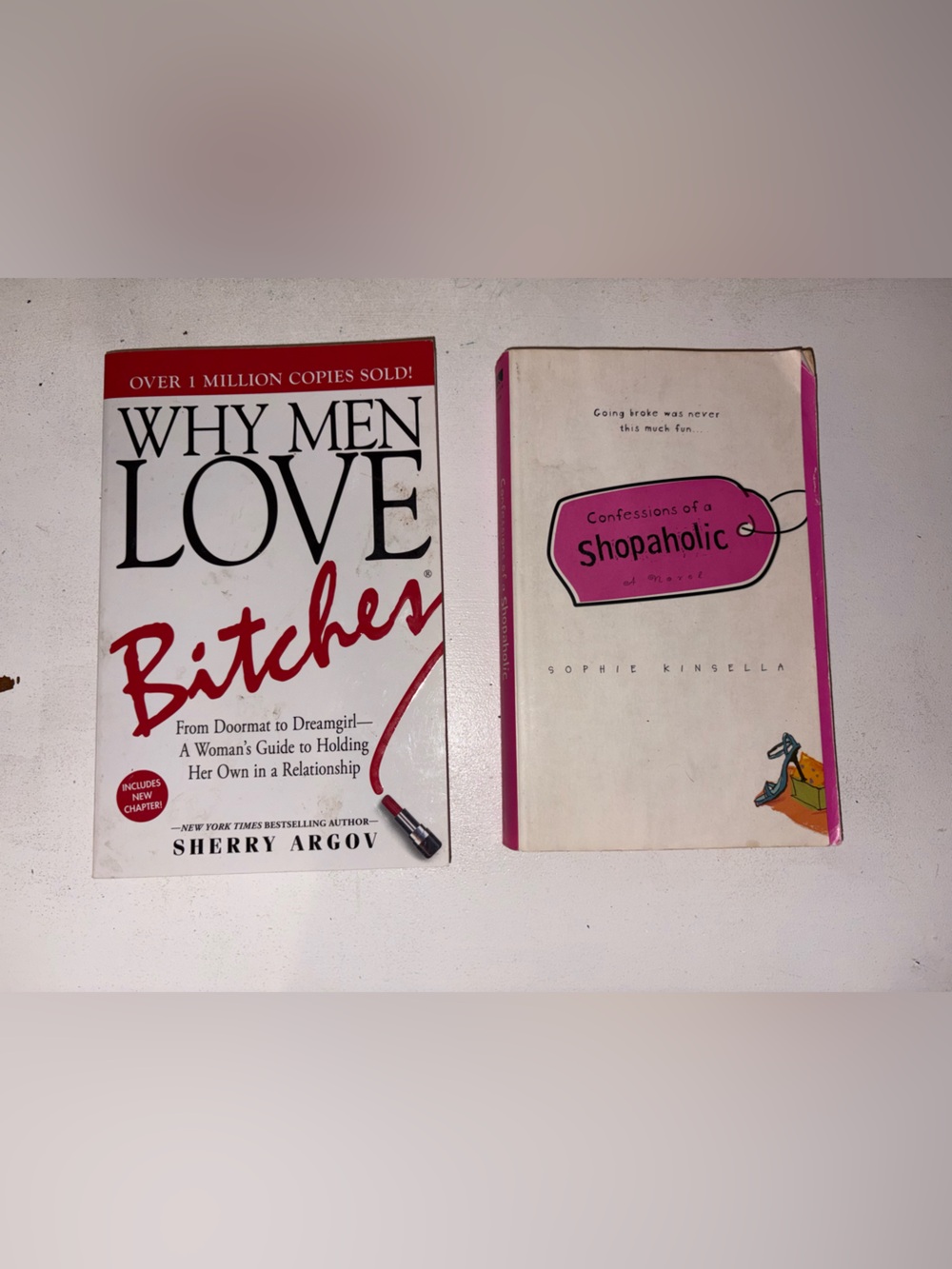 Pair of Paperback Books with Pink and Red Accents